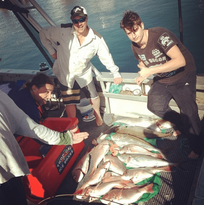 Happy customers onboard fishing charters Fremantle