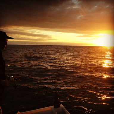 Night fishing with a cold beer